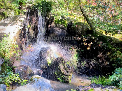 Rainbow in the mini-waterfalls of the garden surrounding Kinkakuji